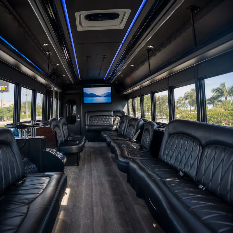 Friends laughing during a Pembroke Pines party bus celebration
