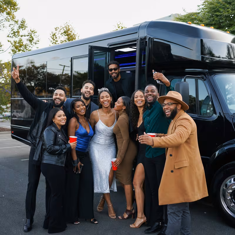 Group boarding a white charter bus for Birthday Transportation transportation in Pembroke Pines