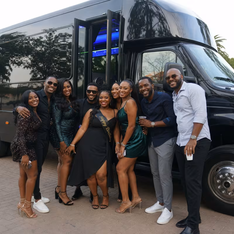 Party bus interior with wraparound leather seating and LED lighting in Pembroke Pines