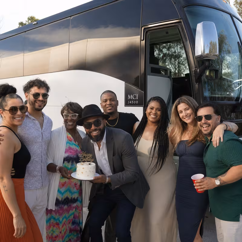 Passengers loading luggage while boarding an Pembroke Pines group shuttle