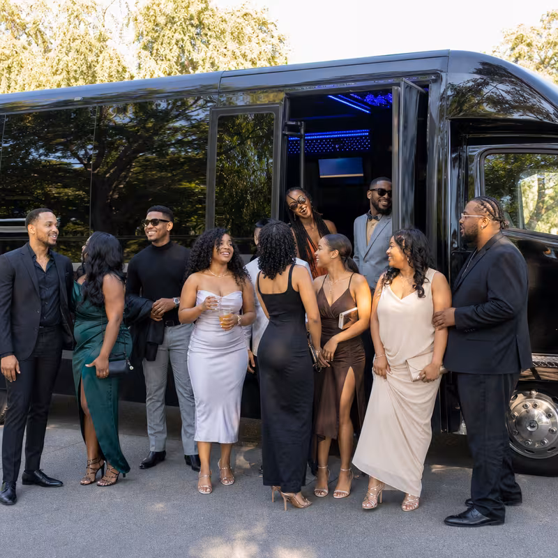 Passengers loading luggage while boarding an Pembroke Pines group shuttle