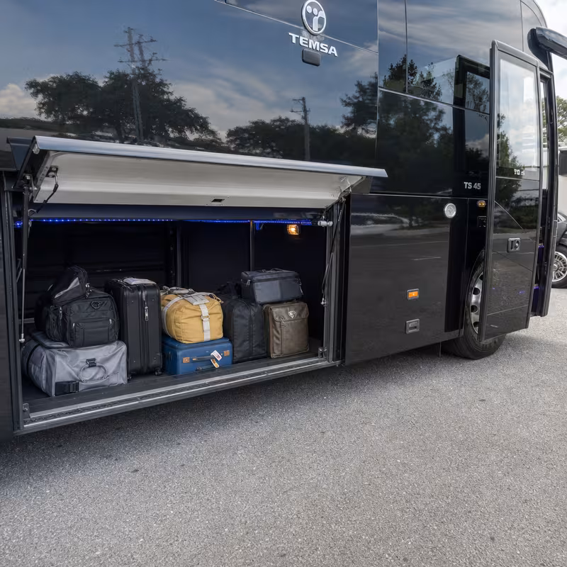 Party bus interior with wraparound leather seating and LED lighting in Pembroke Pines