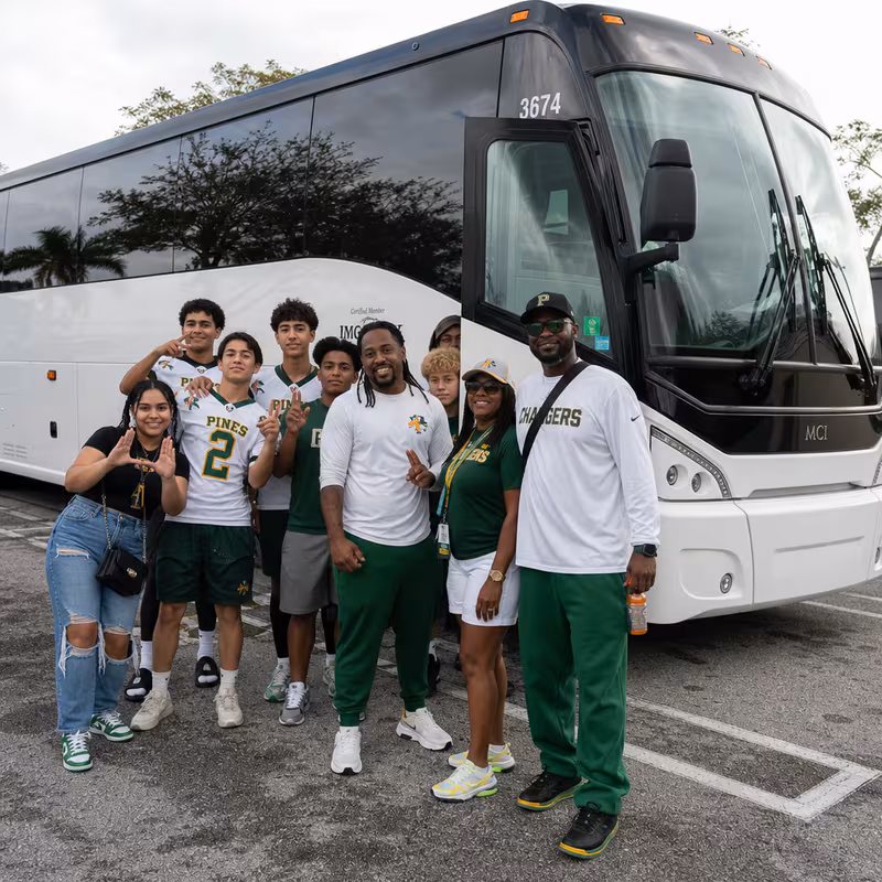 Passengers loading luggage while boarding an Pembroke Pines group shuttle