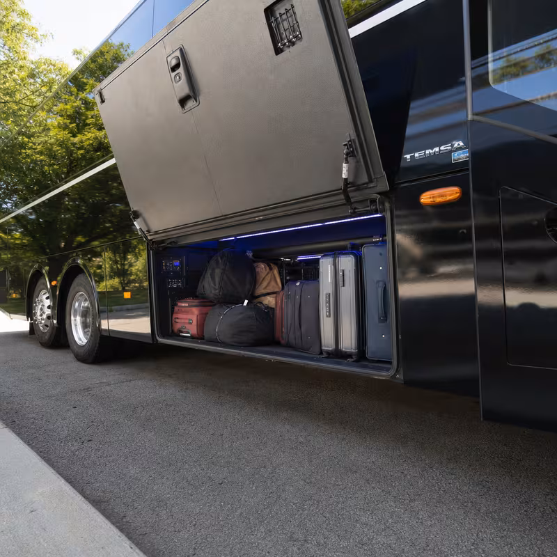 Party bus interior with wraparound leather seating and LED lighting in Pembroke Pines